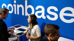 The Coinbase Inc. booth at the Blockchain Week Summit in Paris, France, on Wednesday, April 13, 2022. Photo by Bloomberg.