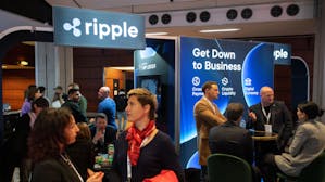 The Ripple Labs Inc. booth at the Blockchain Week Summit in Paris on March 22. Photo by Getty.